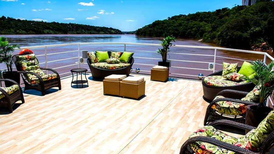 From Foz do Iguaçu: Sunset Catamaran Tour with Meal - Kattamaram II onboard comfort: A/C, a bar, and a dinner you eat while cruising