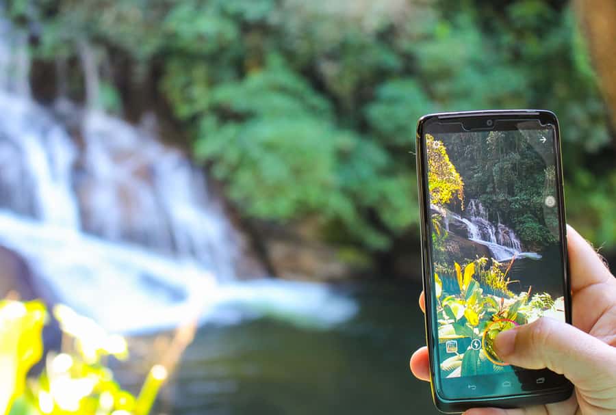 Paraty: Jungle Waterfalls and Cachaça Distillery Jeep Tour - Tobogã rock-slide and watching locals surf the stone