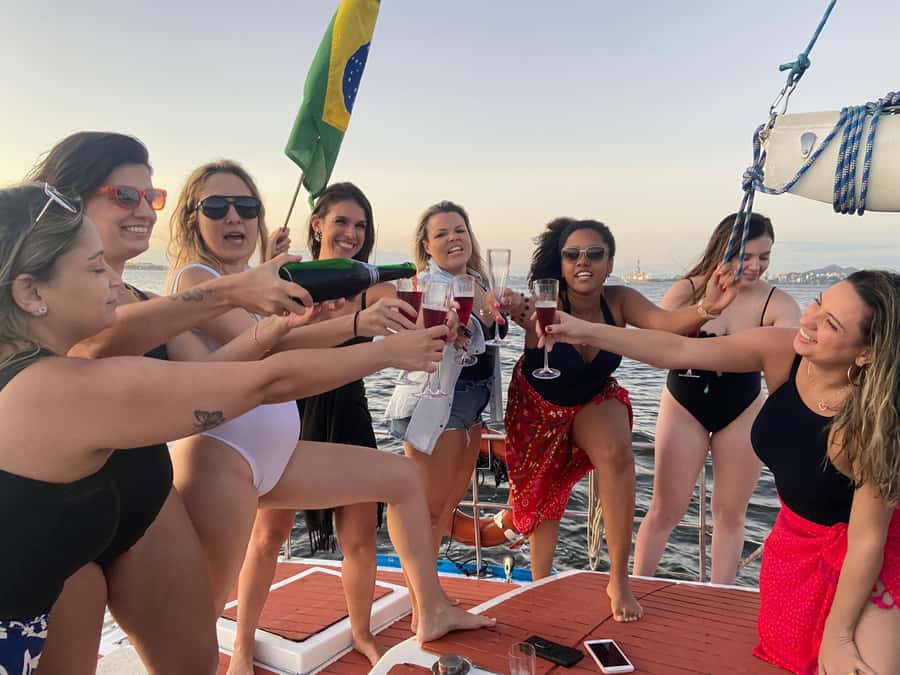Rio de Janeiro: Sunset Sailboat Tour with Open Bar - The swim stop in Guanabara Bay, plus plane-spotting moments